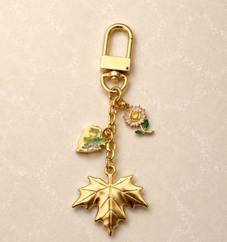 Zomer blad – Yaprak muted gold charm