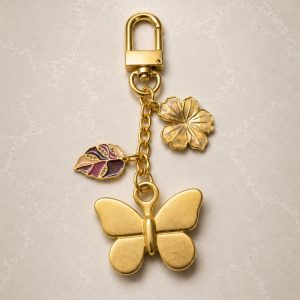 Feuille et papillon - Kelebek Muted Gold charm